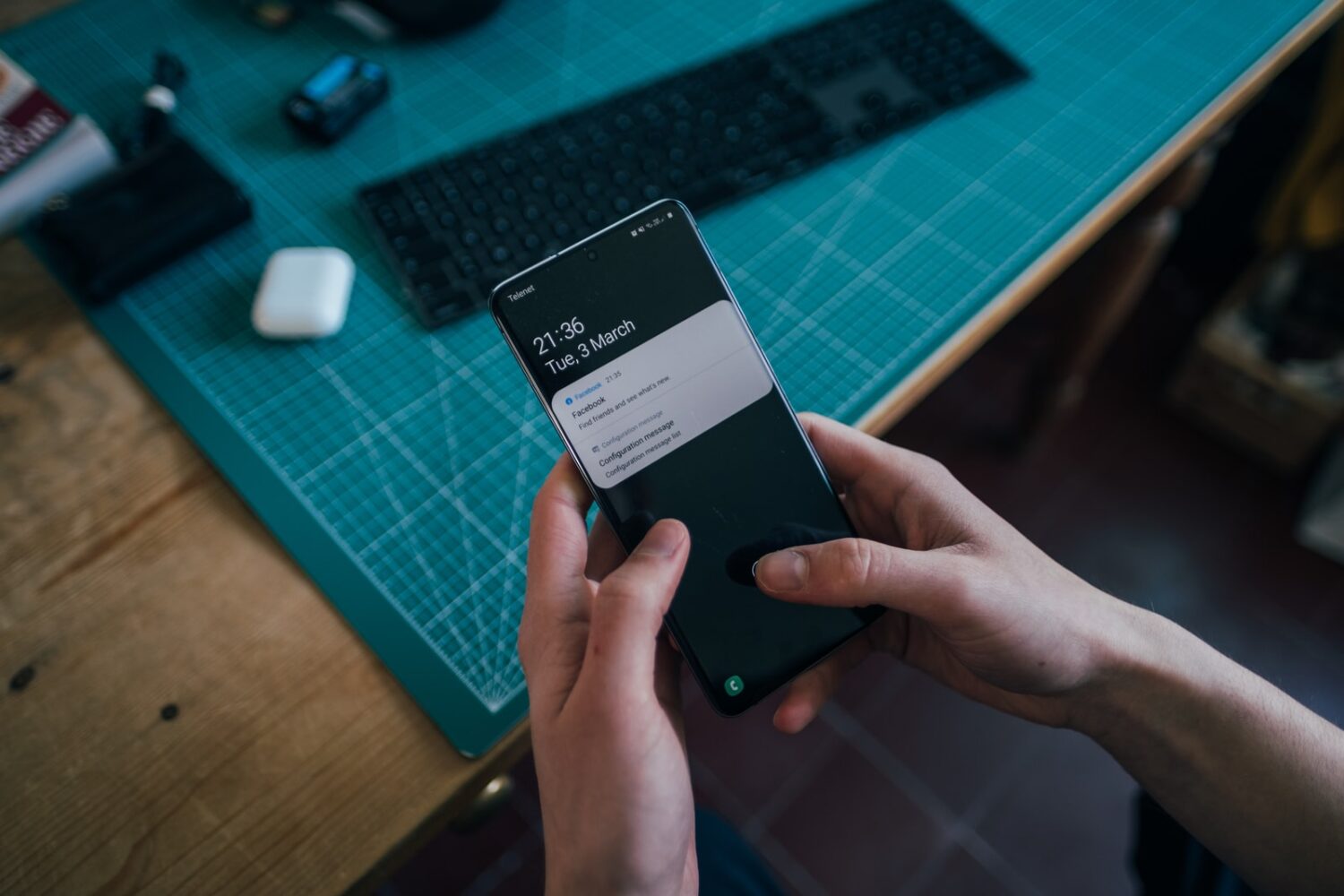 person holding black android smartphone